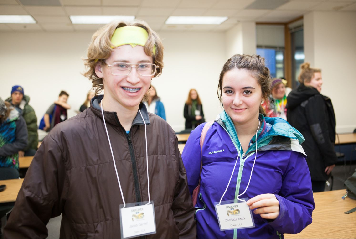 Students Jacob Gerrish and Charlotte Stark flash their name badges after a mock philosophy class durin Discover UAF's InsideOut program in late October 2012.