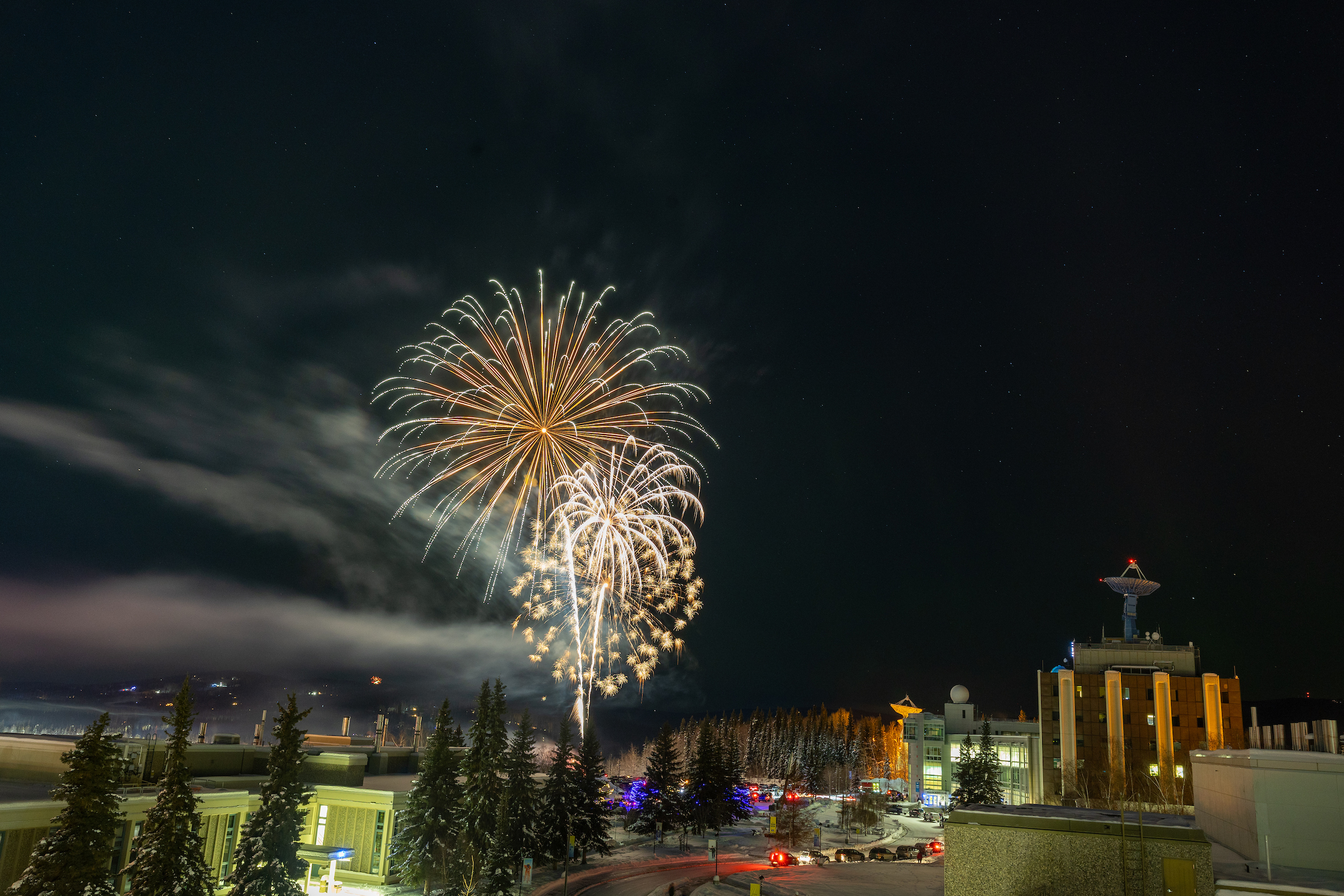 Fireworks launch from the UAF West Ridge during the 2024 Sparktacular celebration