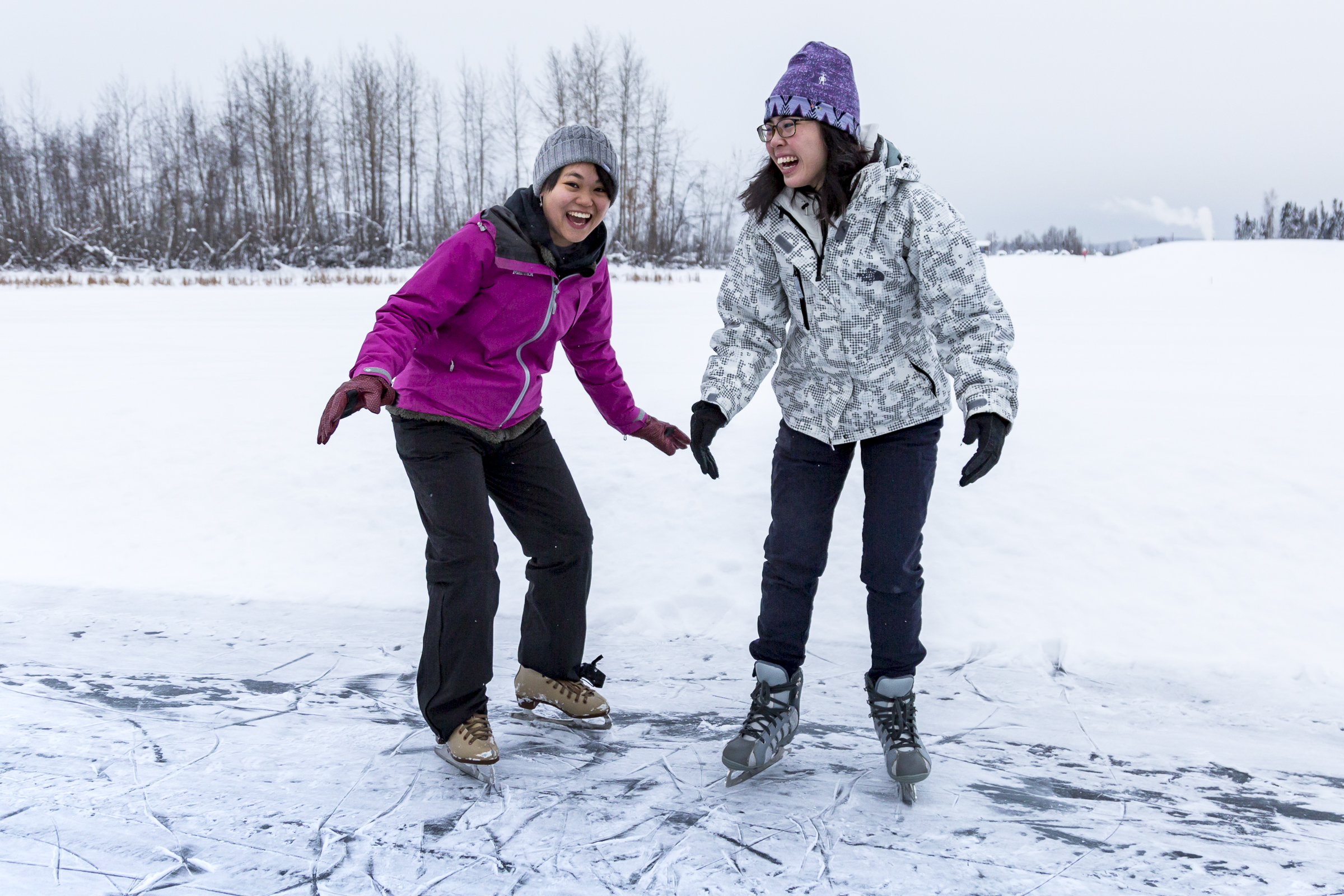 Kasugahara Miki (left) and Natalie Tan Rei Hsi (right) ice skate on the frozen Tanana Lake with Nanook Recreation on Sunday, February 3rd, 2019.