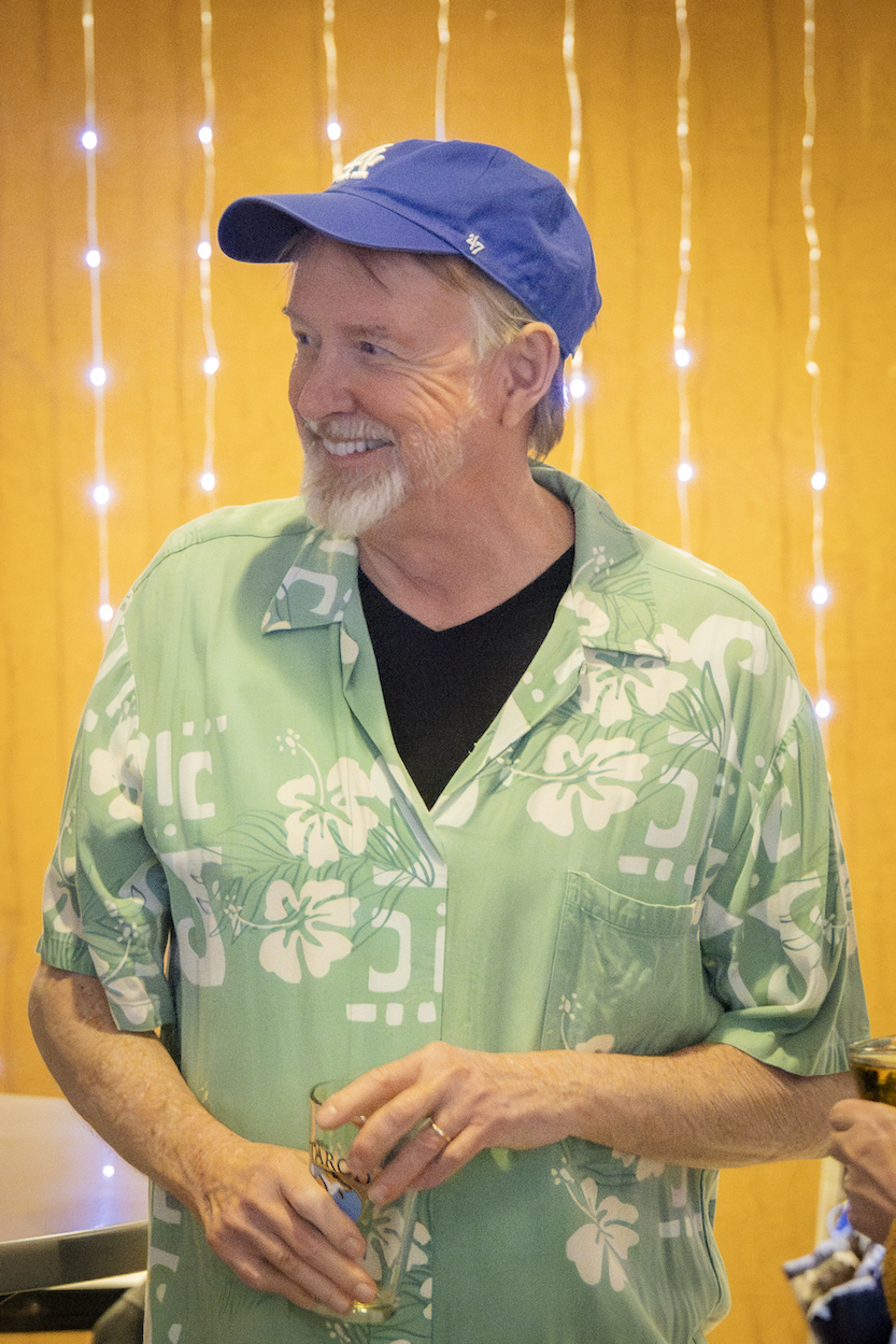 Brian Barnes in a Hawaiian shirt and baseball cap