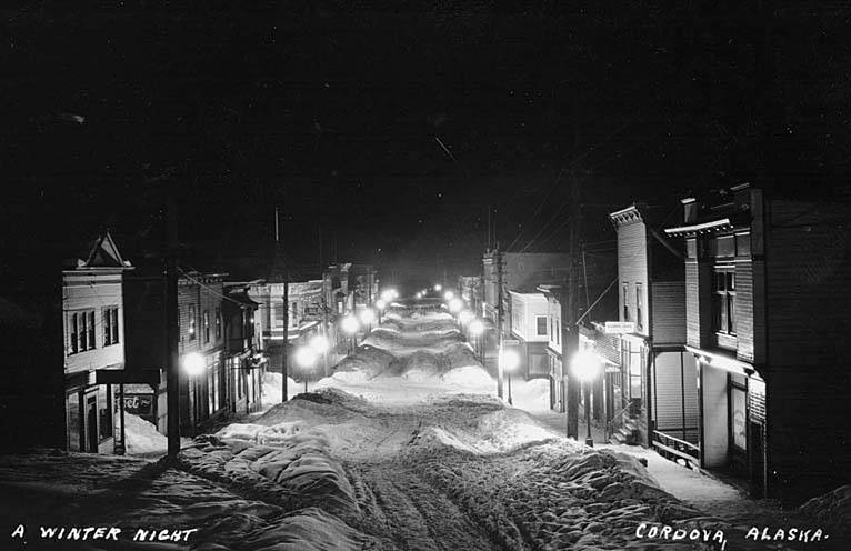 Nighttime winter view of Cordova, Alaska in 1912