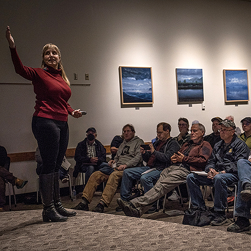 Gwen Holdmann, Alaska Center for Energy and Power founder and associate vice chancellor for research, innovation and industry partnerships at the University of Alaska Fairbanks holding a town meeting.
