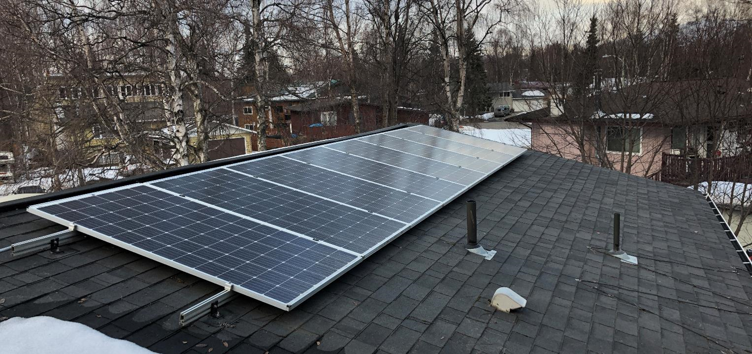 Flush roof-top mounted residential solar panels.