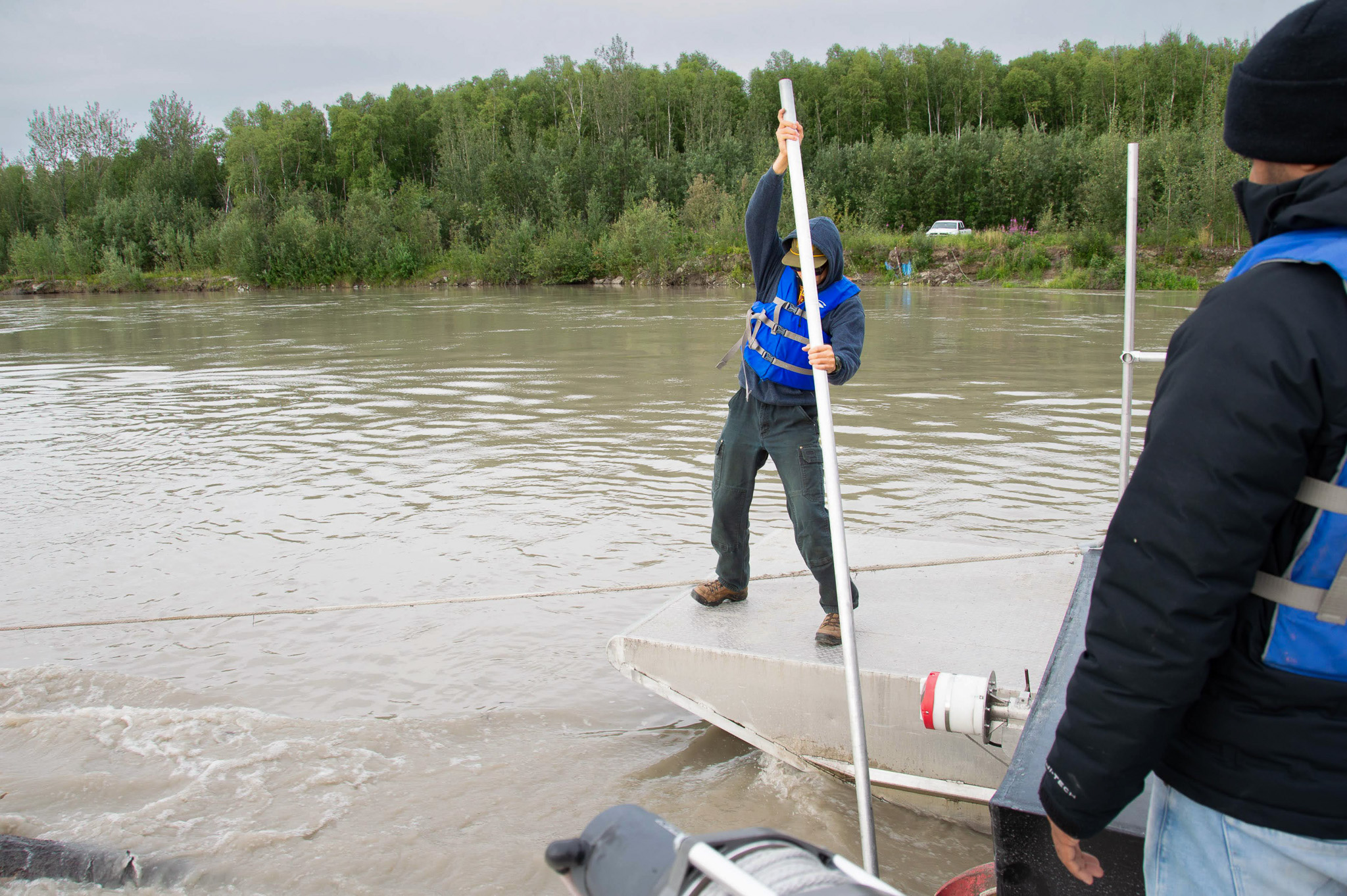 Schuster tries to steer debris away from an acoustic doppler current profiler 