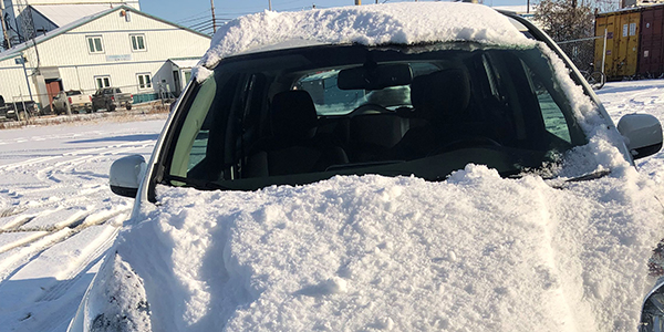 Kotzebue Electric Association’s Nissan Leaf is parked in the middle of winter. Photo by Michelle Wilber/ACEP.