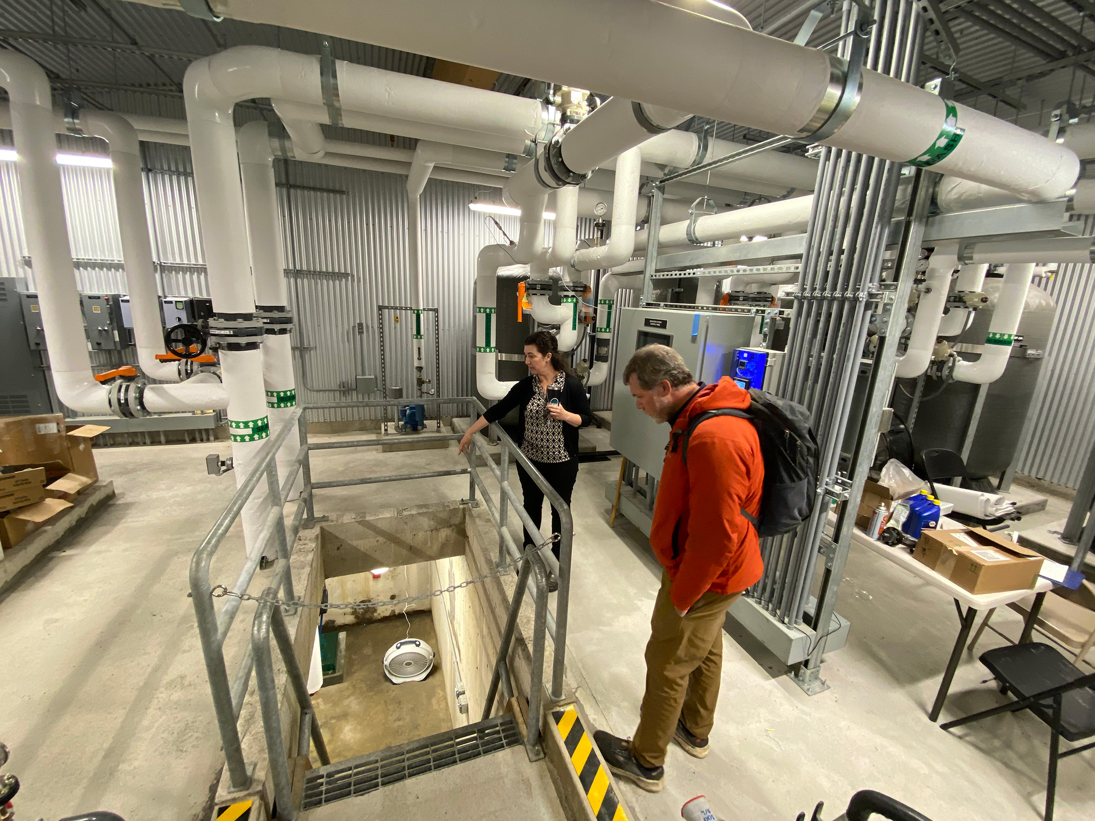 Katrina Hoffman and Jeremy Kasper visit the center’s seawater pump house in Cordova, Alaska.