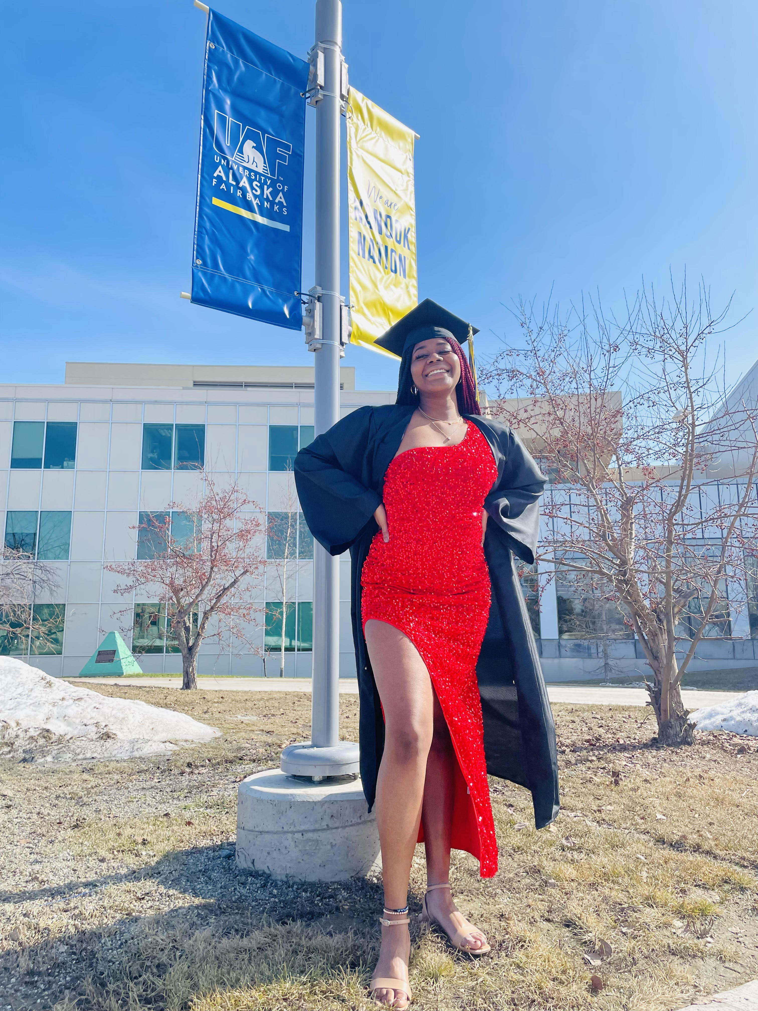 Jessica Egbejimba, a research assistant at ACEP, celebrated her graduation from UAF in May. Photo by Cariane Gonzalez.  Jessica Egbejimba, a research assistant at ACEP, celebrated her graduation from UAF in May. Photo by Cariane Gonzalez.  described by the caption and credit below image