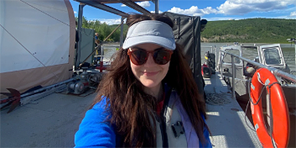 Lauren Leadbetter on the barge at the Nenana River test site. Photo courtesy of Lauren Leadbetter.