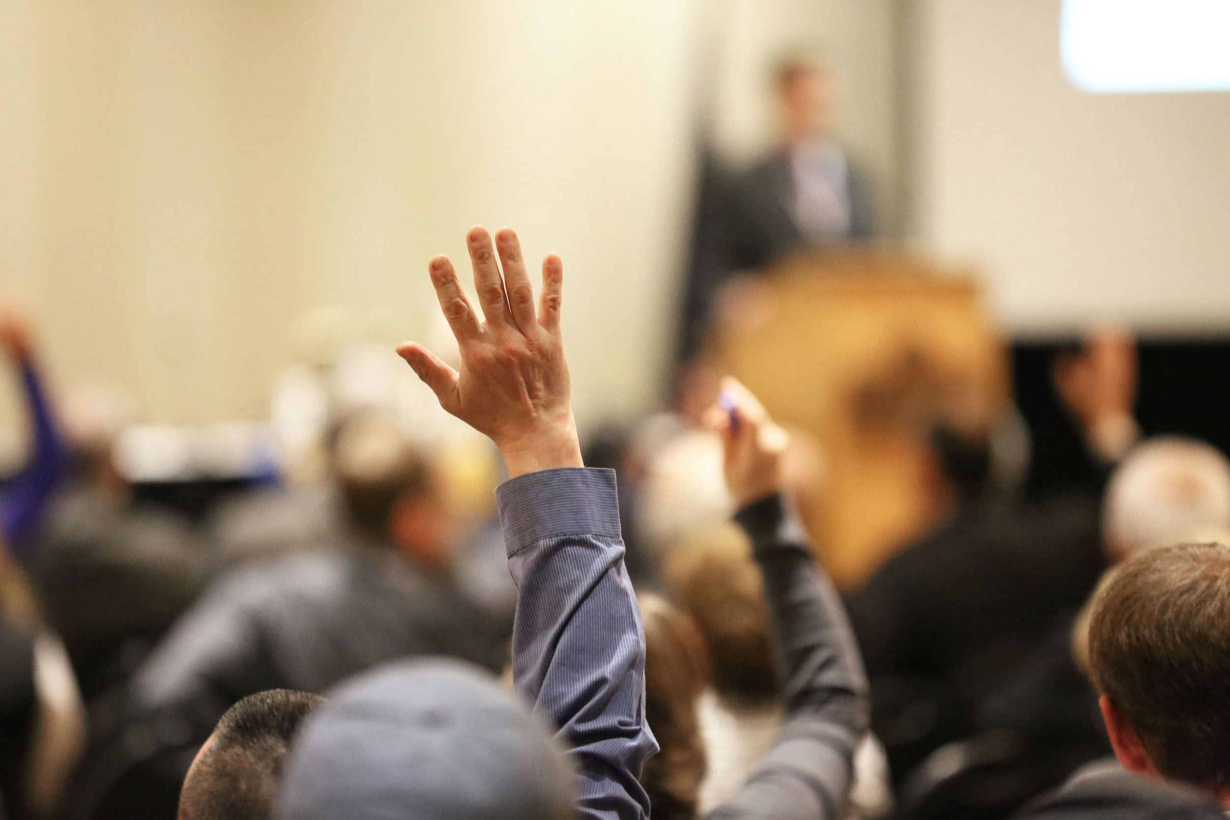 An audience member asks a question at the 2016 Alaska Rural Energy Conference. 