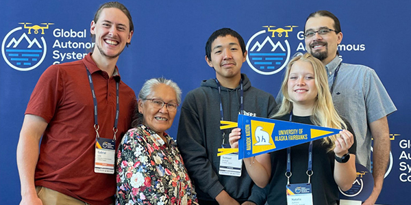 T3 Alaska team at the Global Autonomous Systems Conference: (L-R) Gabe Low, UAF T3 community engagement lead; Eliza Winfrey, Minto Elder and T3 Elder liaison; Samuel Atchak, Bethel T3 student; Natialia Ashton, Wrangell, T3 student; and Dayne Broderson, ACEP. Photo by Douglas Isaacson.