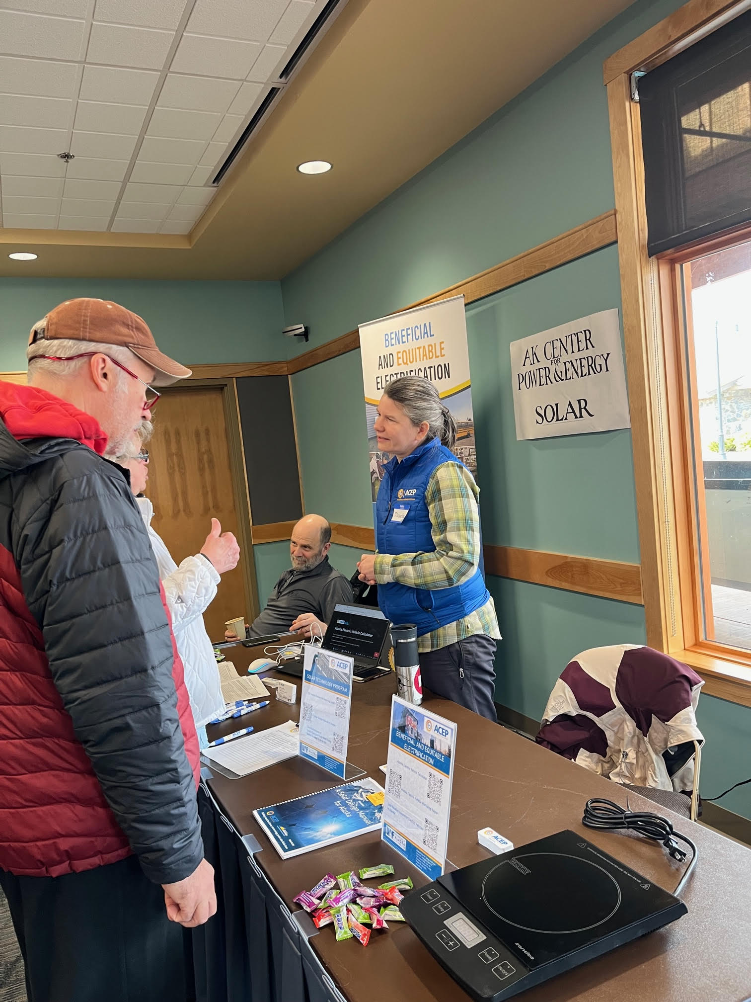 Michelle Wilber speaks to Sitka community members about beneficial electrification at the Sitka Electrification Expo on March 18. Photo courtesy of Michelle Wilber.