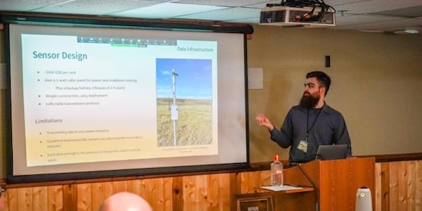 UAA master's engineering student Henry Toal presents his thesis work at the Western Alaska Interdisciplinary Science Conference in Dillingham, Alaska. He partnered with ACEP's solar team on his work. Photo by Michael Lindemann.