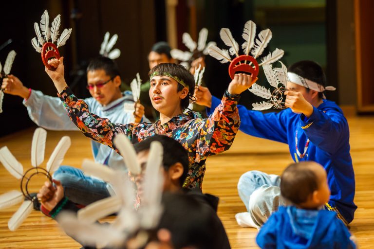 Mechanical engineering major Bax Bond performs with the Iñu-Yupiaq Dance Group during the 2013 Festival of Native Arts. Photo by JR Ancheta.