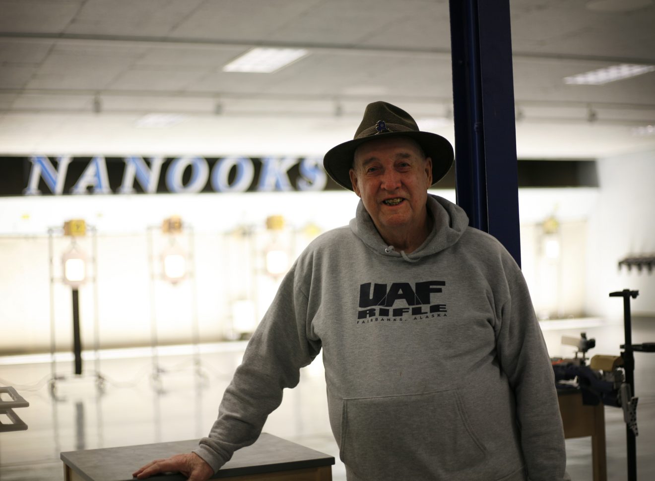 Joe Nava stands in front of the firing lanes at the E.F. Horton Shooting Arena at the University of Alaska Fairbanks. Elizabeth Talbot photo