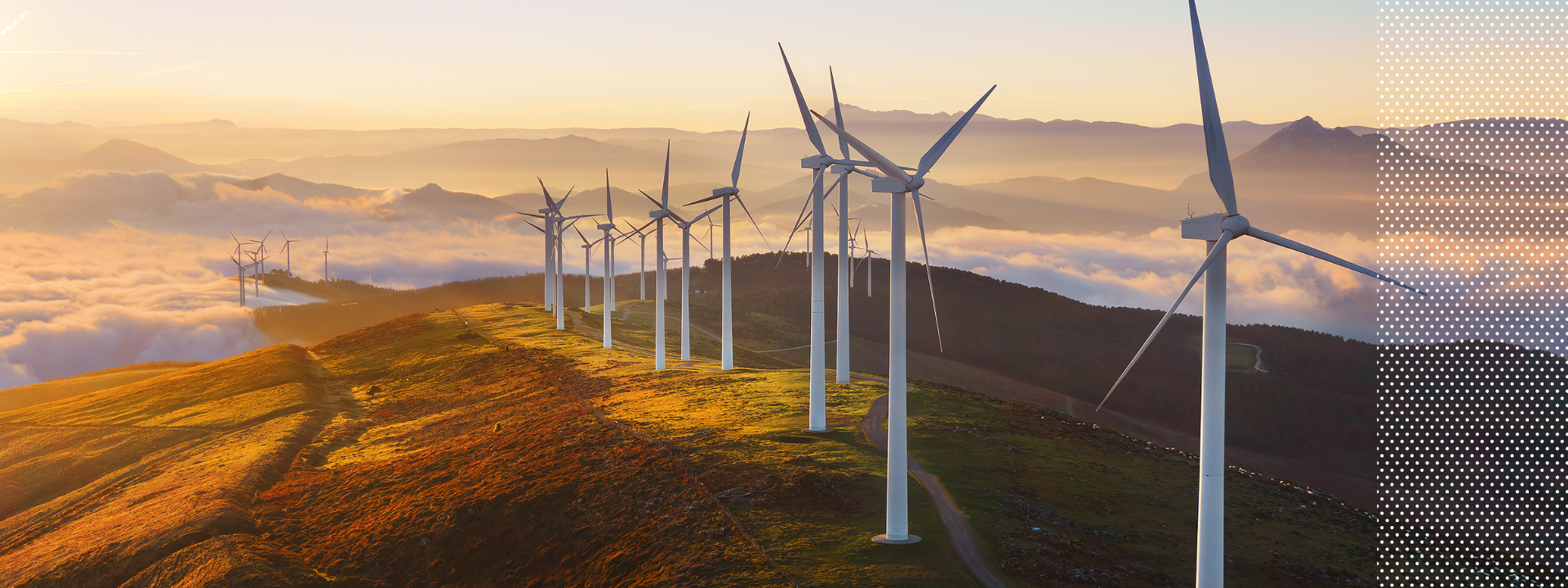 Wind turbines on a hill. Image from Canva