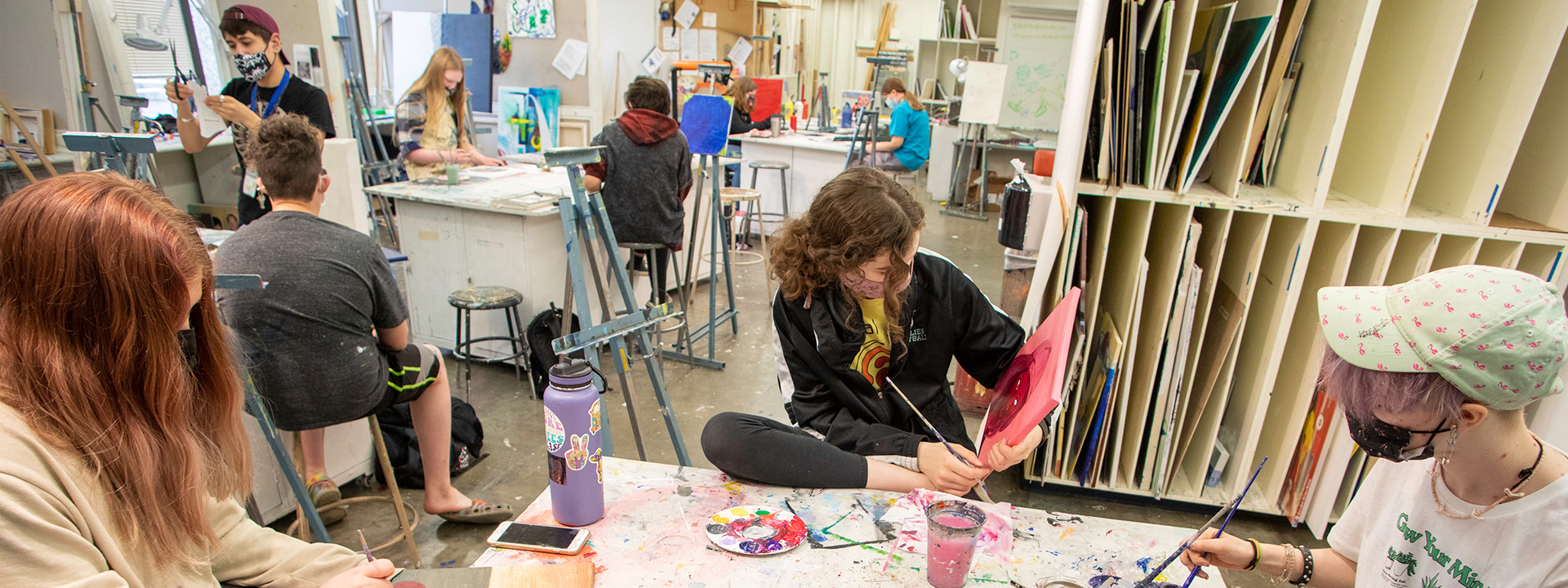 (from left) Oakley Mccullough, Elise Theis and Jo Tapp work on their creations in Painting class during the 2022 Summer Visual Arts Academy at the UAF Art Department in the Fine Arts Complex on the UAF campus Tuesday, June 14, 2022. UAF Photo by Eric Engman
