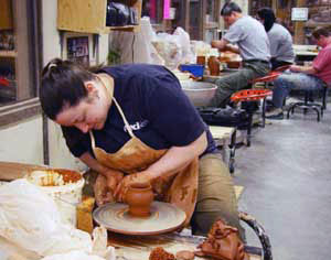 Student on pottery wheel