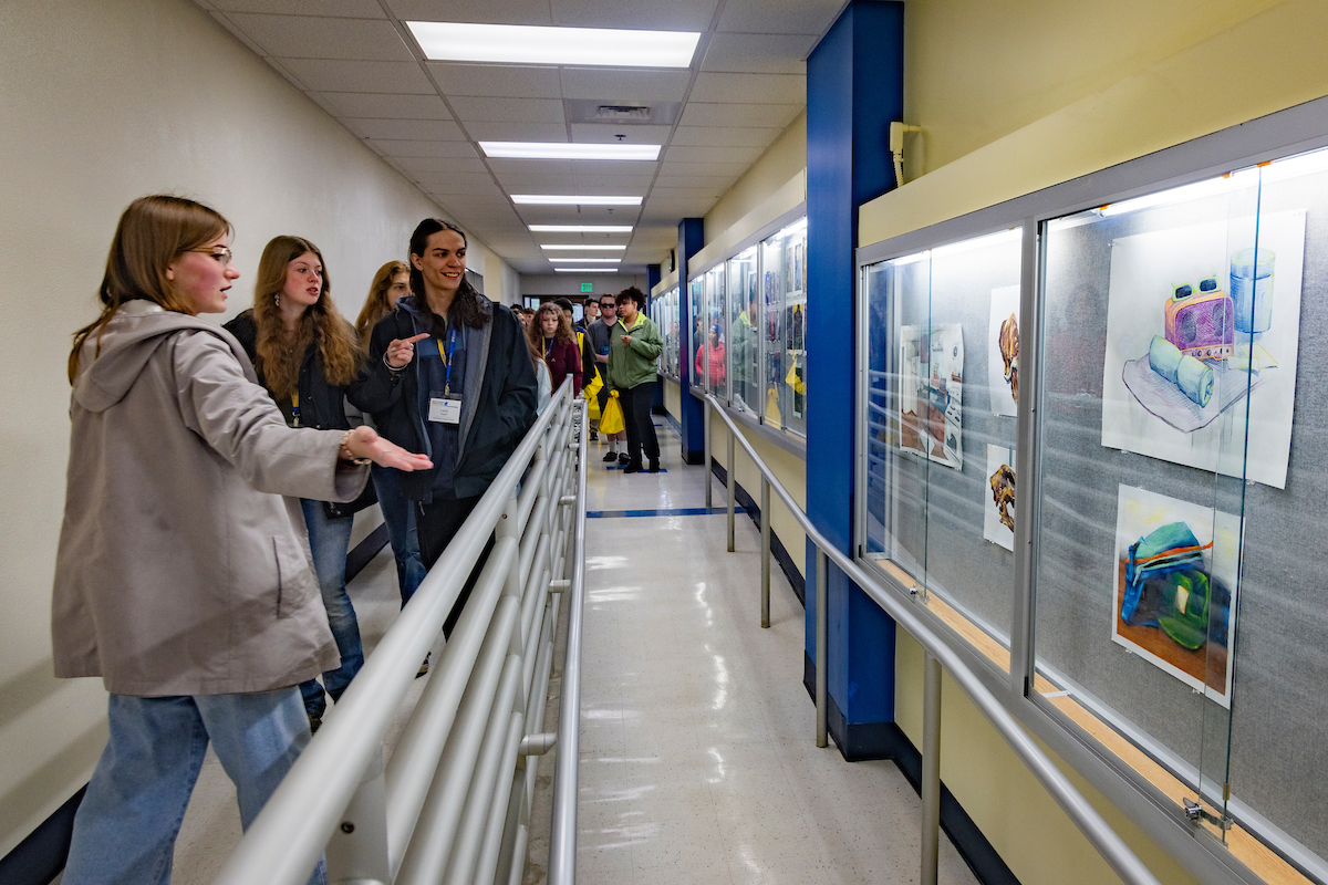 Orientation leaders Elliot Costello and Delaney Wright lead first year students on a tour of the Fine Arts Building as part of the 2024 new student orientation Wednesday, Aug 21, 2024. (UAF photo by Leif Van Cise)