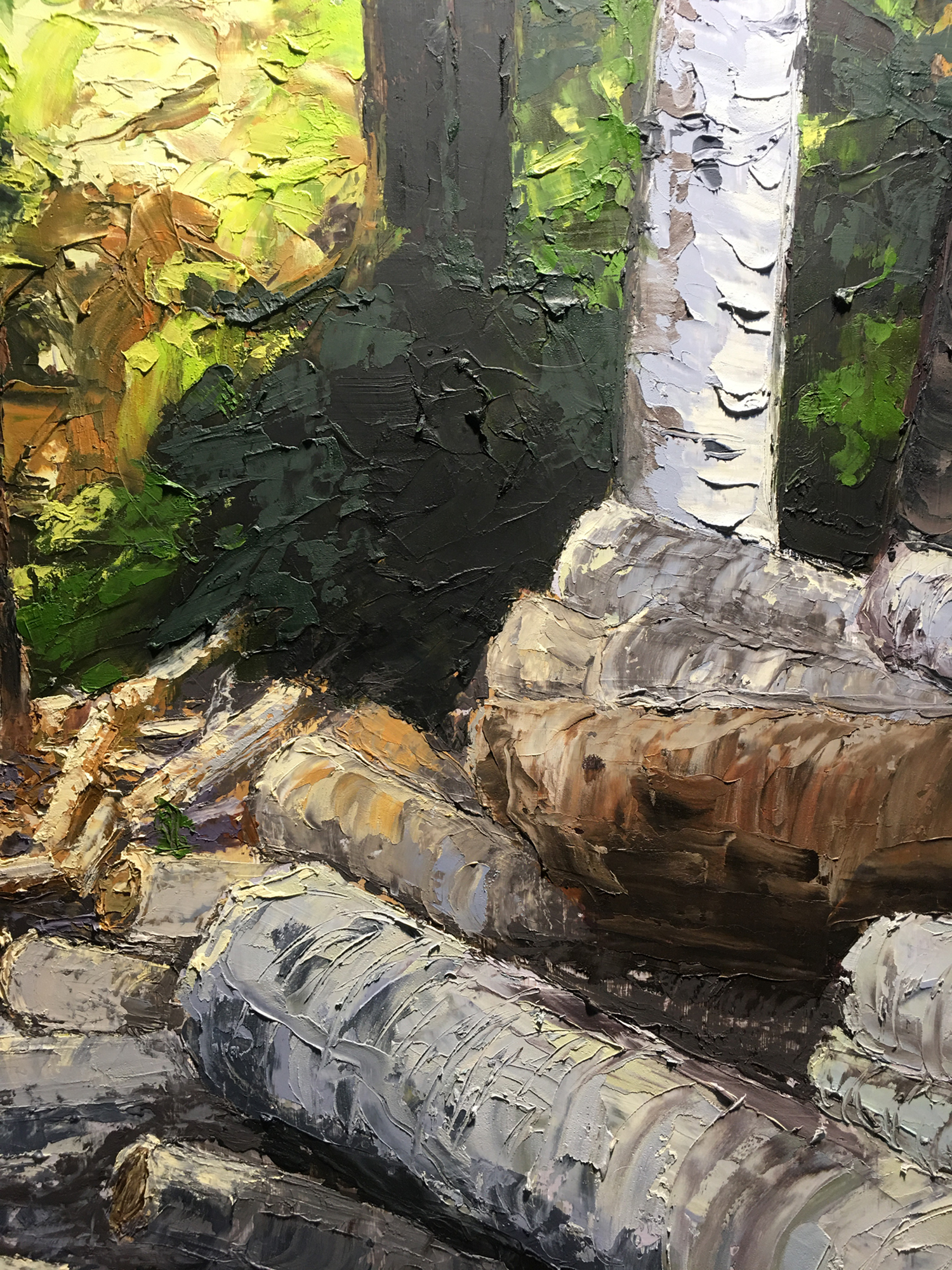 Detailed image of the birch trees piled in the painting Summer Woodpile. Photo courtesy of Allison Juneau