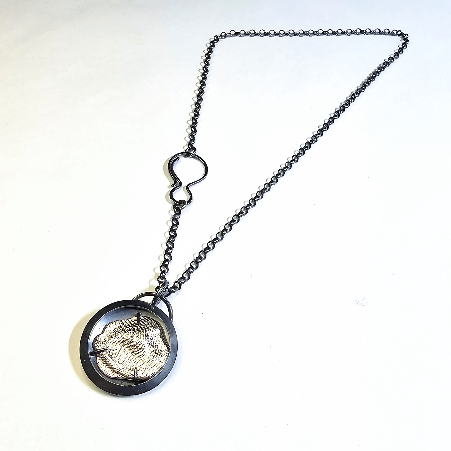 Silver topography pendant, image courtesy of Christen Booth