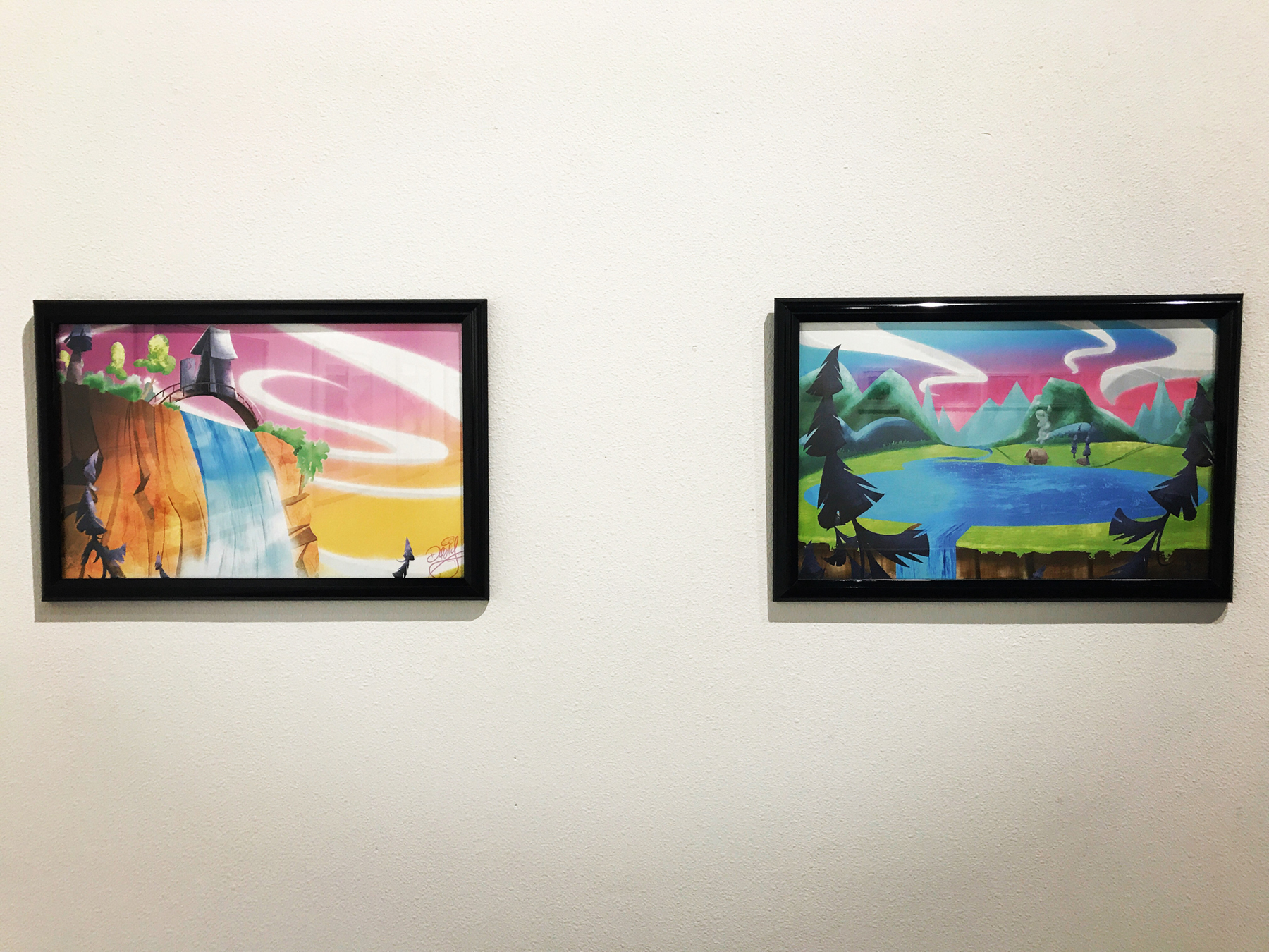Two digital prints hang on the wall during David Glover's thesis show, Art of the Mudsuckle Ritual, image courtesy of the artist