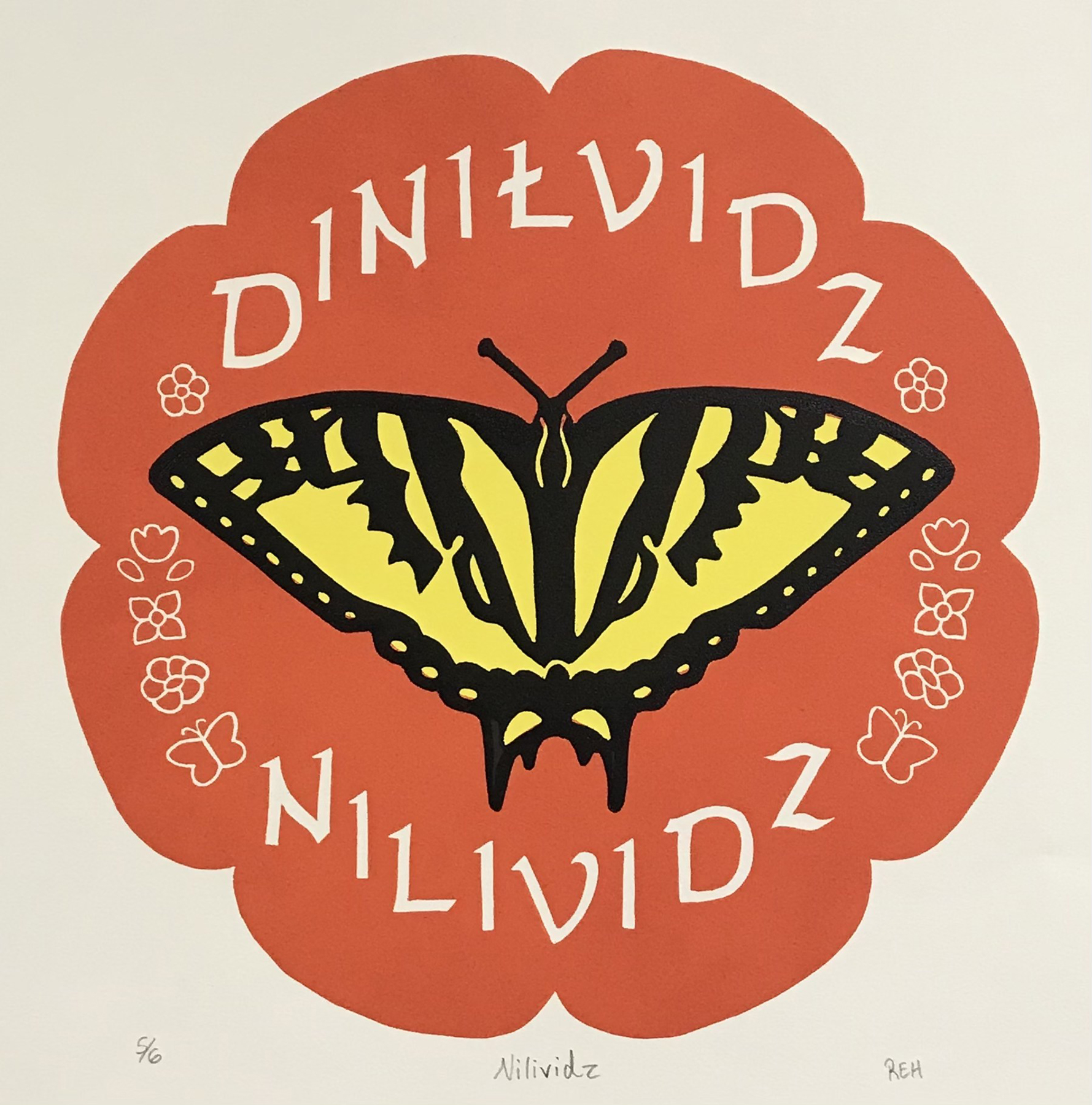 orange flower shaped crest with a yellow and black butterfly, courtesy of the artist