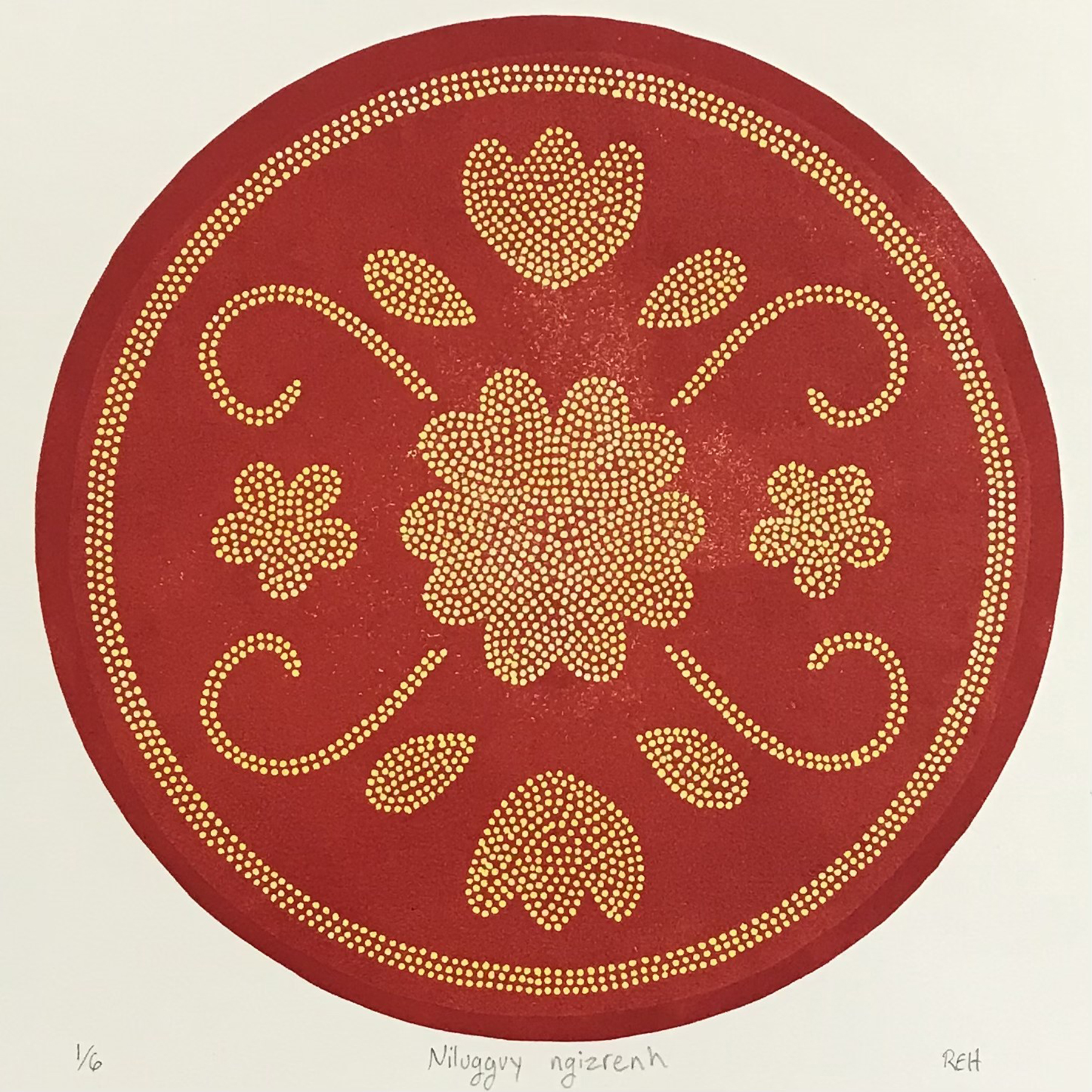 A red circular crest with small yellow dots creating an intricate pattern inside, courtesy of the artist