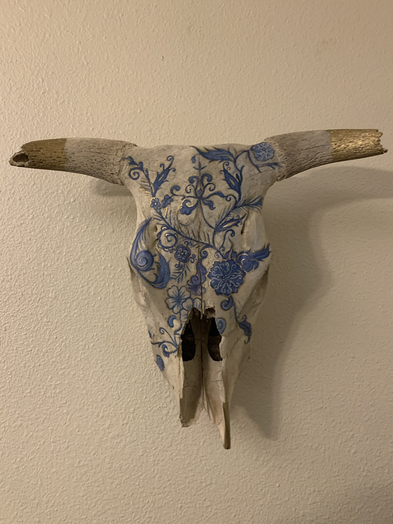 Natural bull skull with blue china pattern created with colored pencils and alcohol ink. image courtesy of Indi Walter