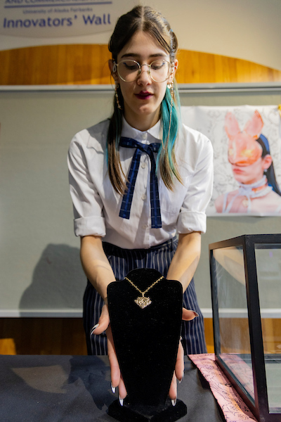 Marina Gonzalez Mazo showcases a variety of her handmade jewelry designed and casted with 3D modeling software, at the 2024 RCA day event in the Wood Center, 4/4/24. (UAF photo by Leif Van Cise)