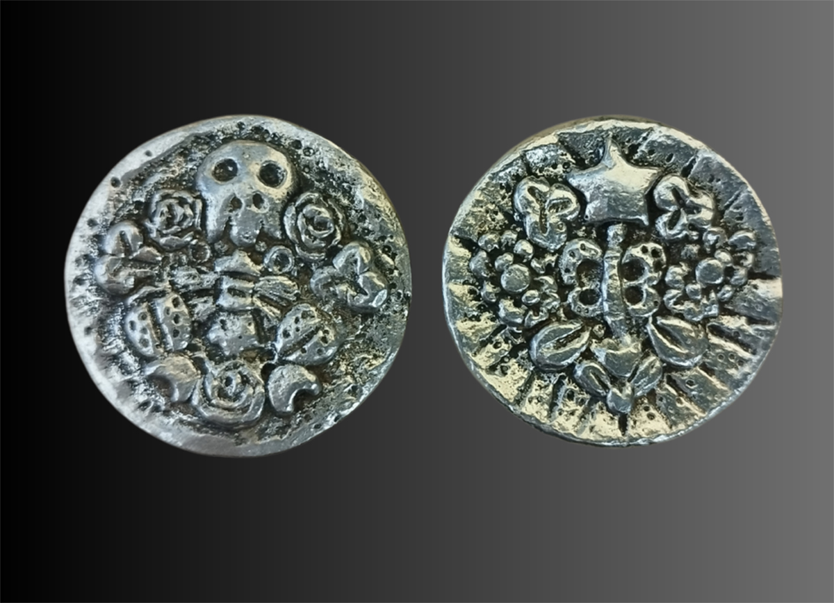 2 silver coins. Image courtesy of the artist