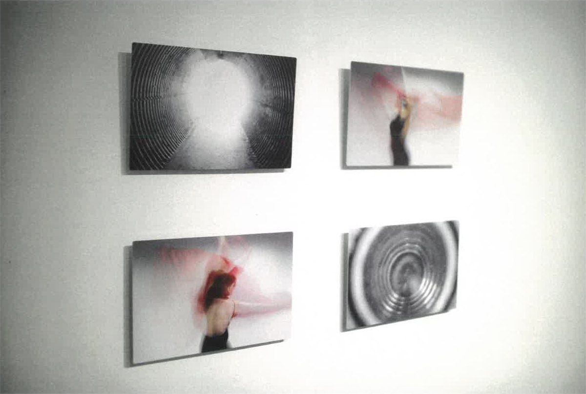 A two-by-two series of aluminum photographic prints. Two are black and white tunnel images. The other two are long exposure portraits on a white background. Image courtesy of Naomi Hutchquist