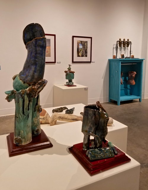 Ceramic sculptures on pedestals in the UAF Art Gallery. Image courtesy of Olena Ellis