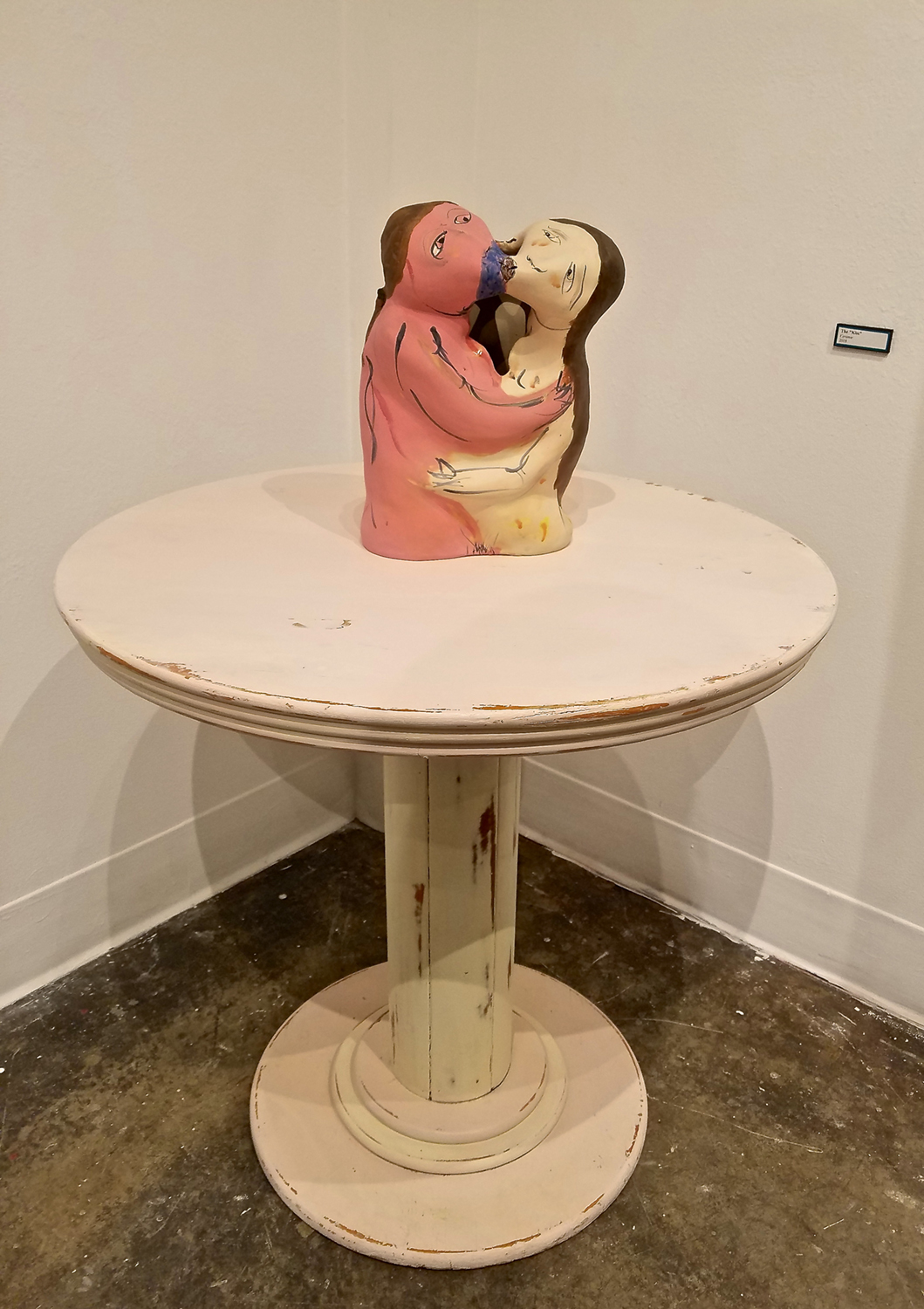 Ceramic statue of two figures kissing. Image courtesy of Olena Ellis