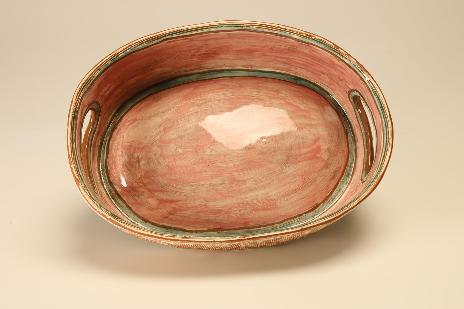 pink ceramic platter with copper interior, image courtesy of the artist