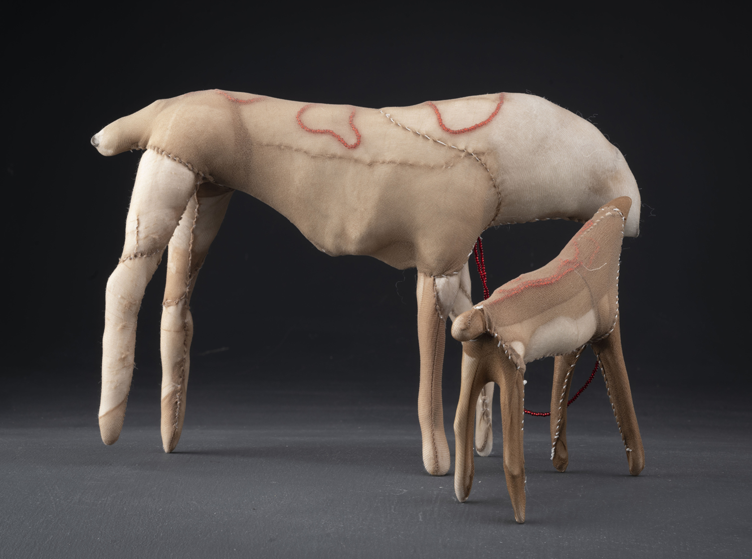 Sculptures of a mother moose and her calf, courtesy of the artist