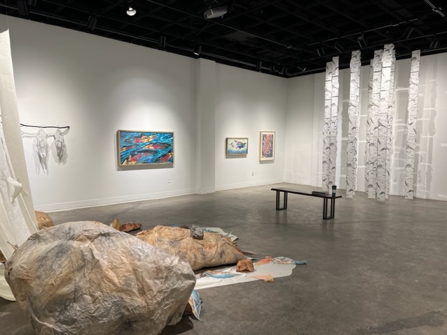 A wide shot of the installation of The Cascade Effect, Susan Andrews' MFA exhibition, in the UAF Art Gallery. Image courtesy of the artist