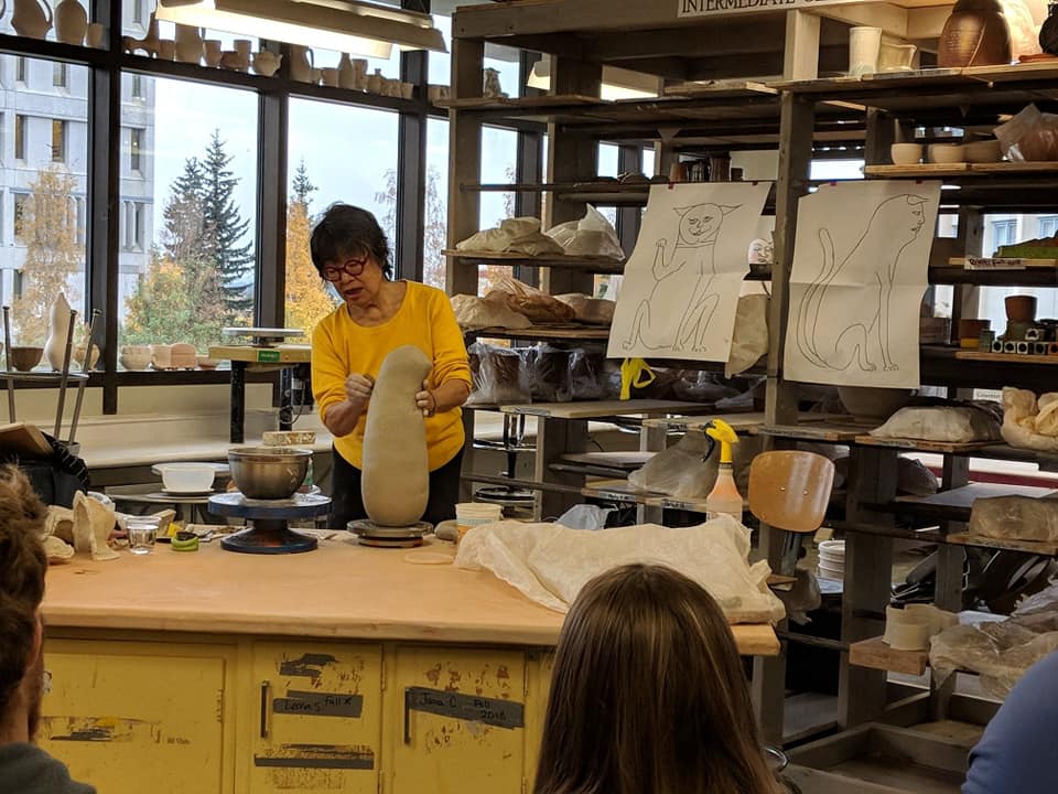 Ceramic artist Patti Warashina performs a demo for UAF Art students.