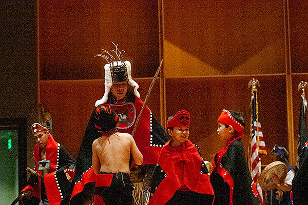 Dancers in traditional red and black capes perform at the 2004 Festival of Native Arts. UAF photo by Marina Santos.