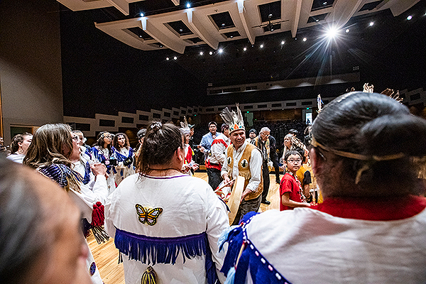 Dancers and drummers perform on stage during the 2019 Festival of Native Arts. UAF photo by JR Ancheta.