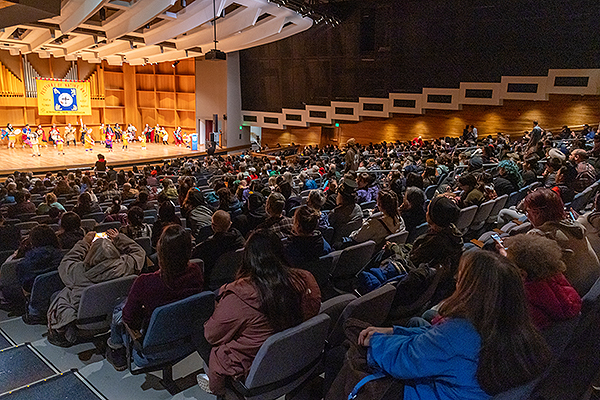 Spectators fill the Davis Concert Hall to watch a performance during day two of the 2024 Festival of Native Arts. UAF photo by Eric Engman.