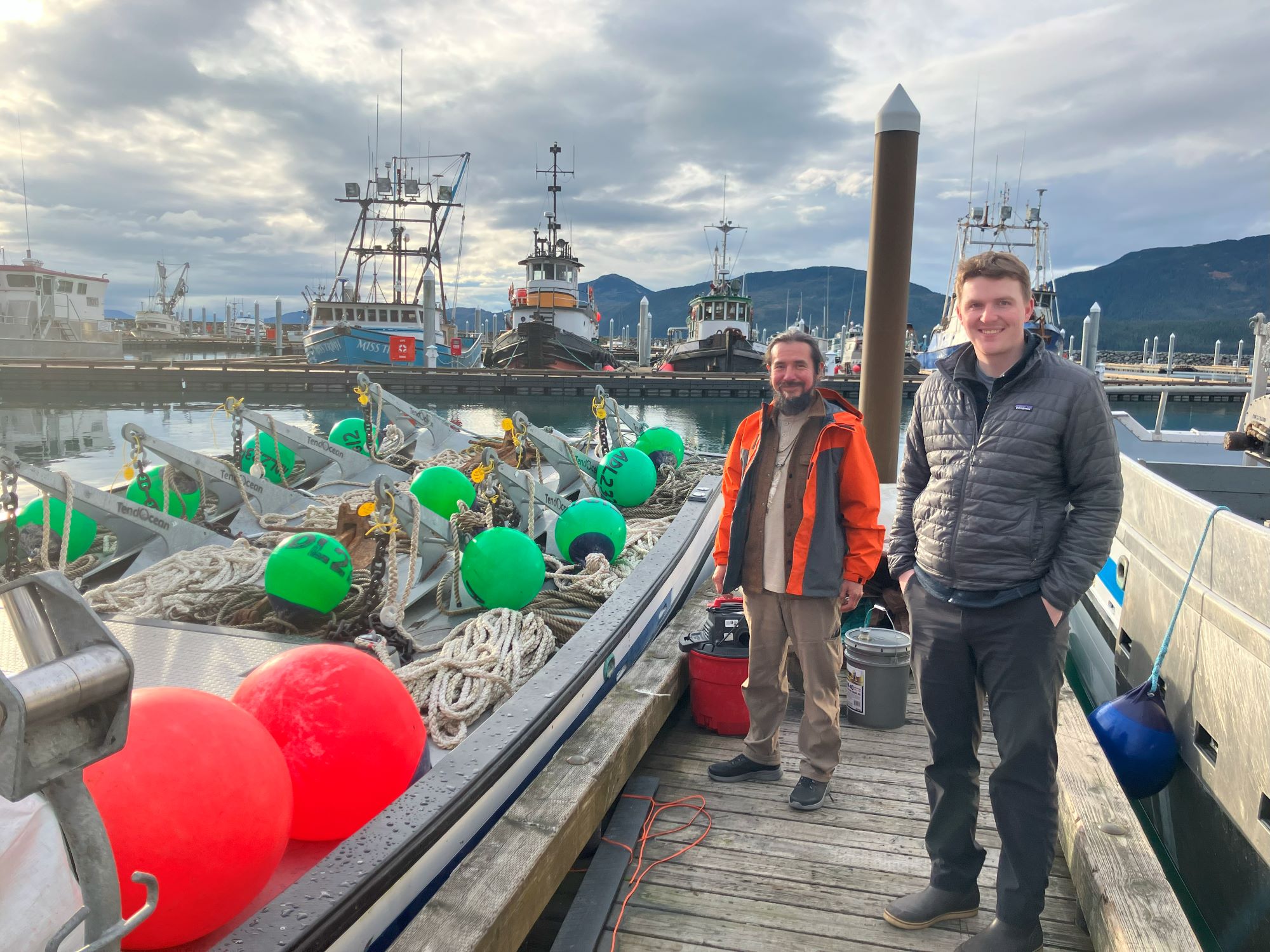 Project team members Calvin George and Gus Lewis evaluate energy use by a vessel preparing to set anchors for a kelp farm in Cordova.