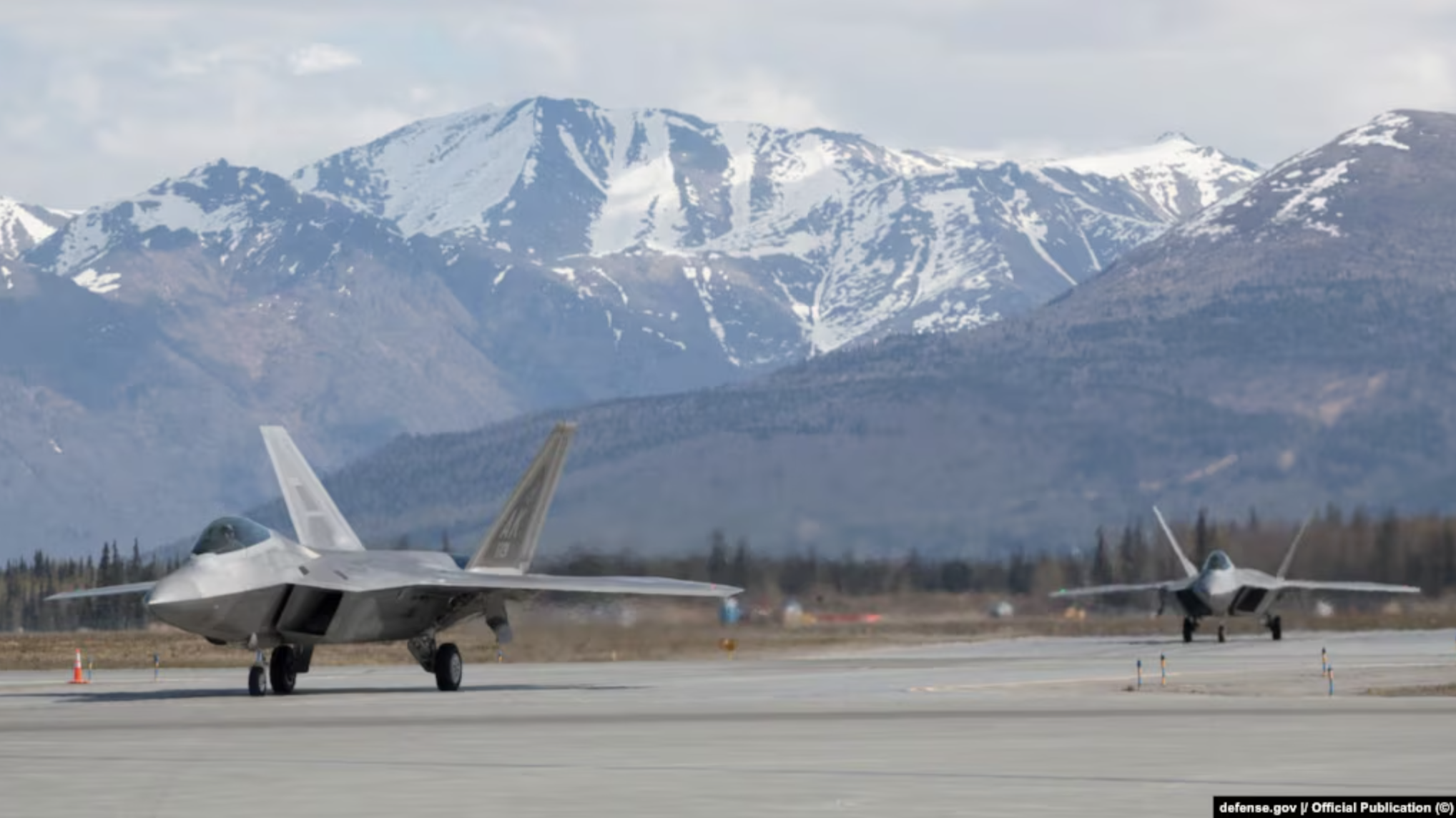 planes in front of mountains