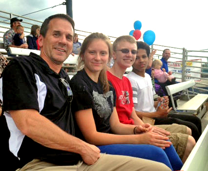 Tim at a Goldpanners game with his daughter Kaylee, a UAF student, and his son Jesse, a sophomore at West Valley High School