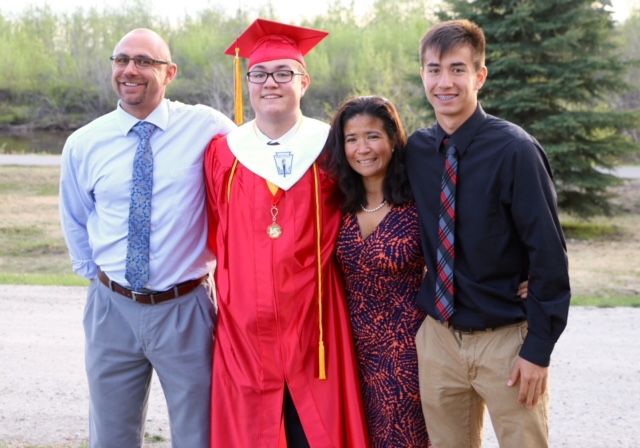 Anthony Rizk with his son Kobe, wife Michelle, and son Drew at the 2017 West Valley High School Graduation