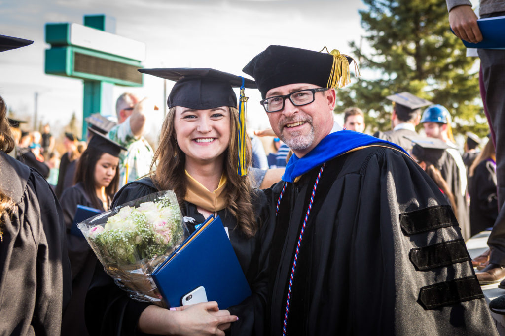 Cam and his daughter Shelby at Commencement 2017. UAF Photo by JR Ancheta.