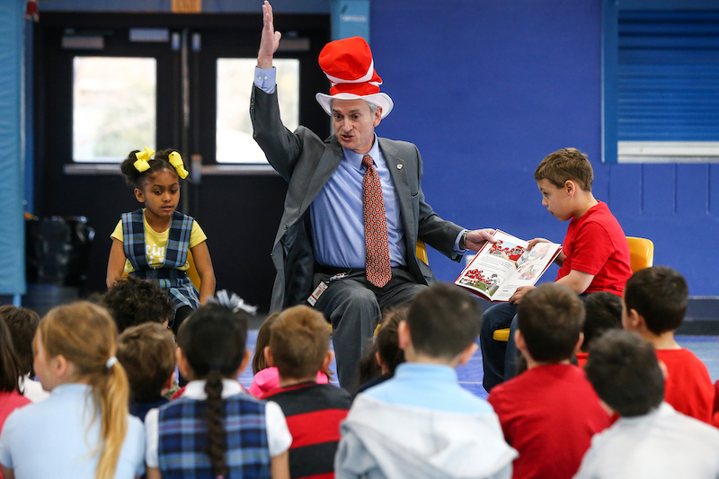 Kansas City Chiefs CFO Dan Crumb reads to students at the Nativity of Mary school for Read Across America Day on March 2, 2020.