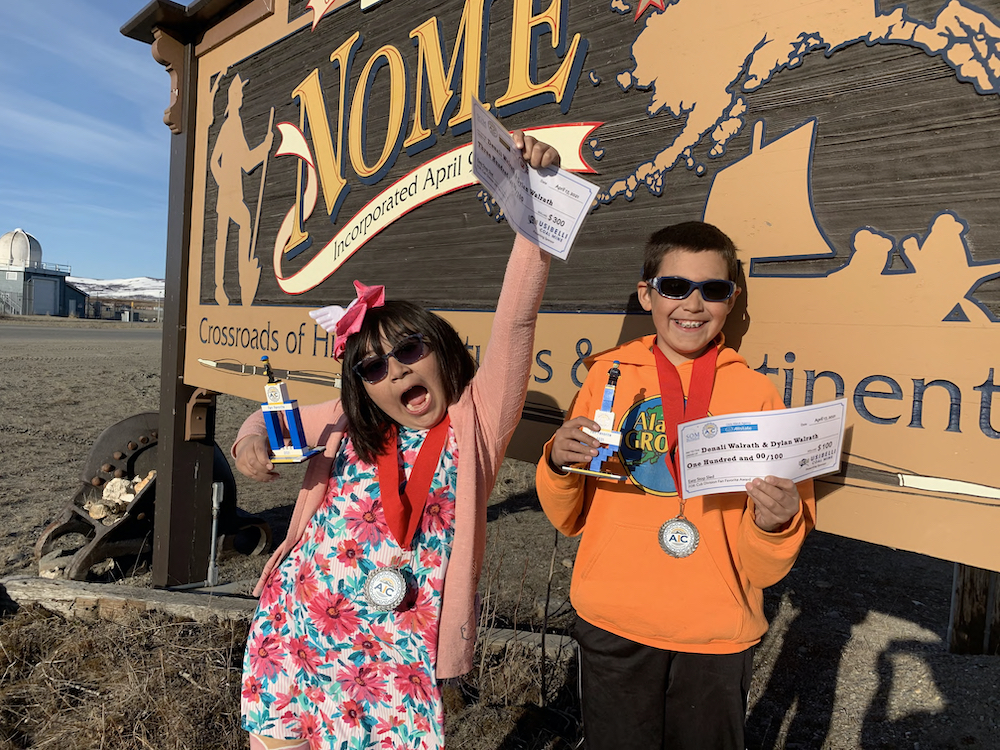Denali and Dylan with their AIC winnings. Photos courtesy of Doug Walrath. 