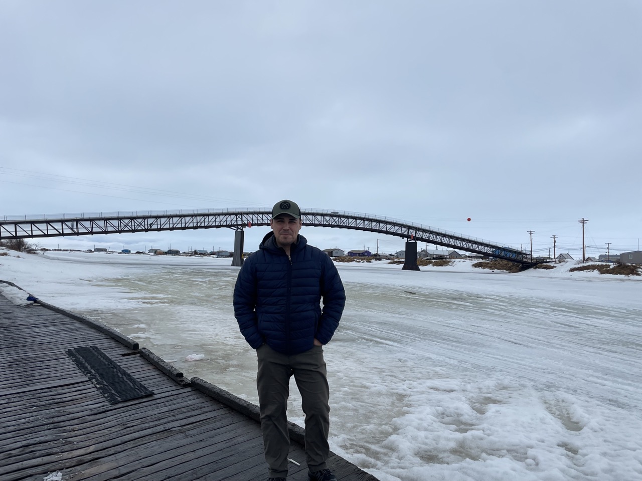 Anthony Picasso stands in Selawik after presenting to an elementary school about the potential opportunities in the Alaska Military Youth Academy. 