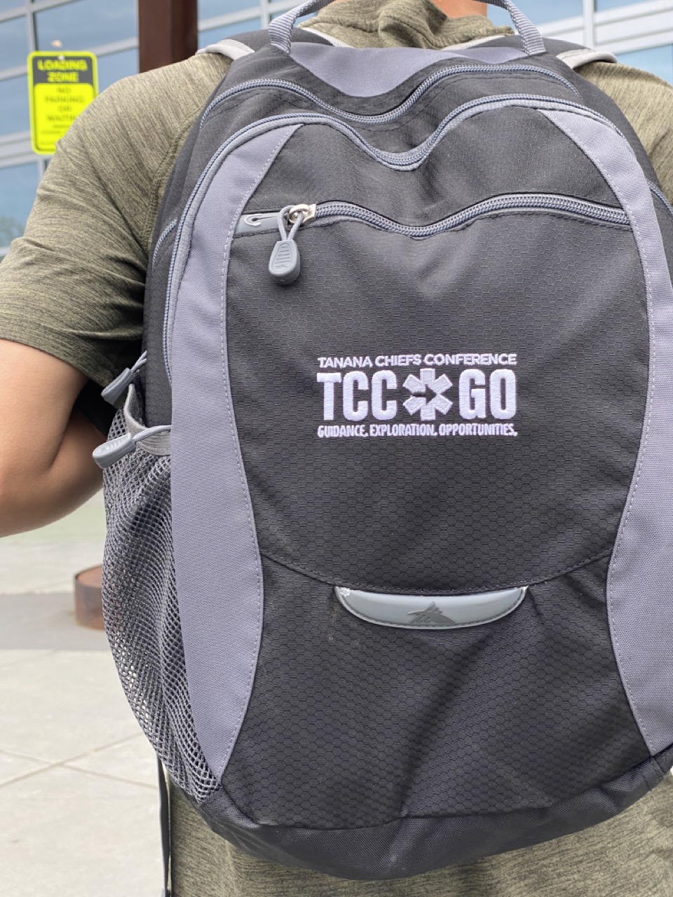 A student uses his TCC GO backpack