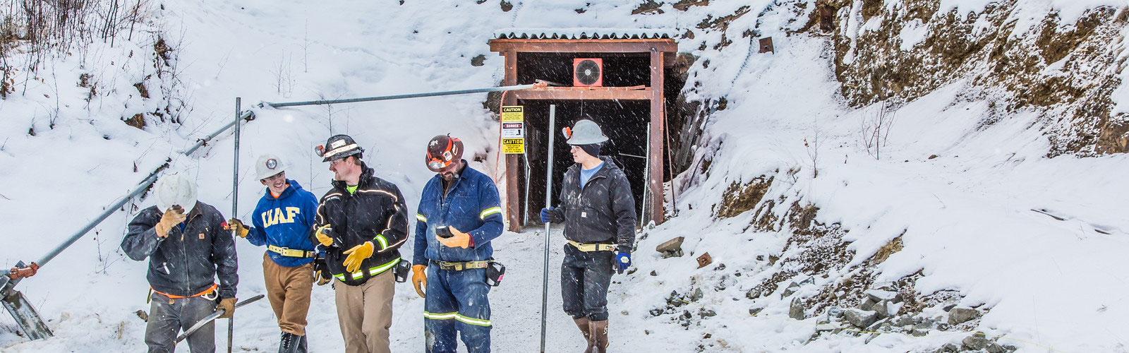 People exiting Silver Fox mine.